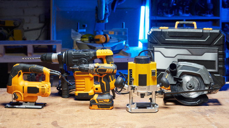 Different DeWalt power tools on a table