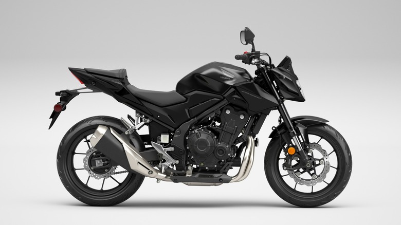 a Honda CB500 Hornet in a studio