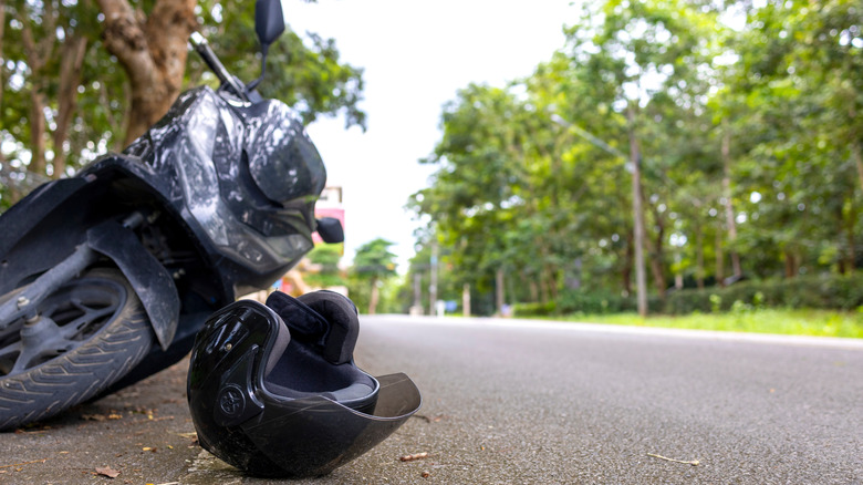 Helmet fallen of a motorcycle on road