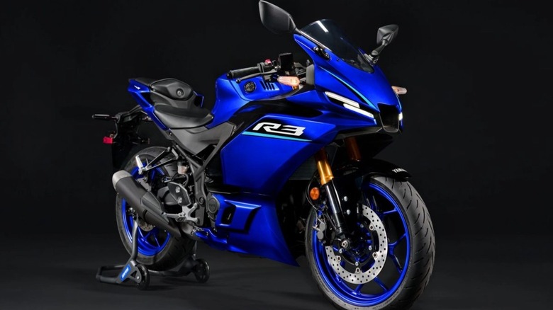 Blue 2026 Yamaha YZF-R3 motorcycle on black background