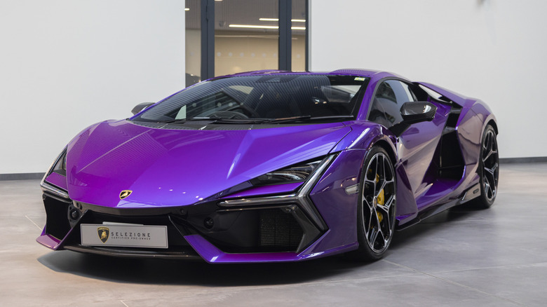 A purple Lamborghini Revuelto parked in a dealership