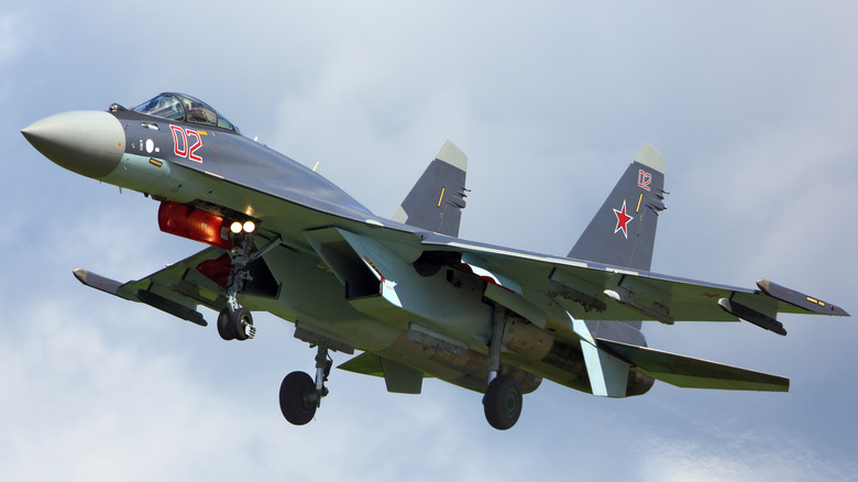 Su-35 Flanker with landing gear down taking off