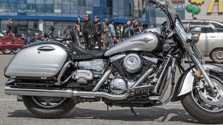 A silver Kawasaki Vulcan 1700 Voyager/ Vasquero motorbike parked on display