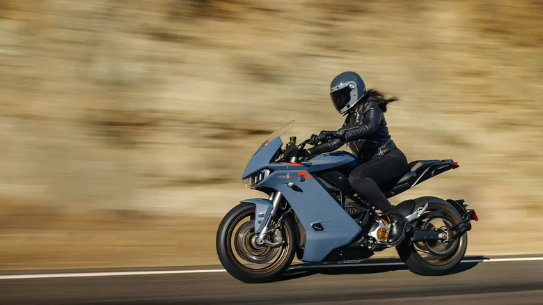 A blue Zero SR/S being ridden by a rider in full black kit