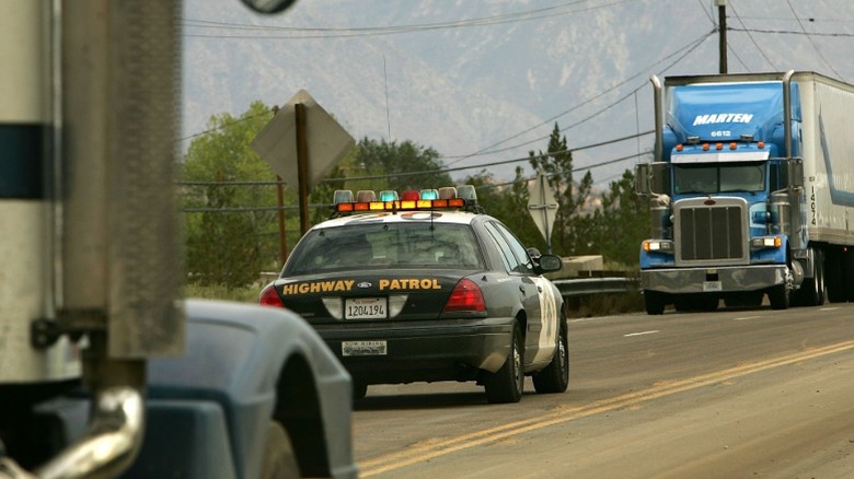 Trucks and car on California Route 138