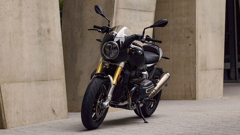 BMW R 12 nineT parked in front of a concrete building