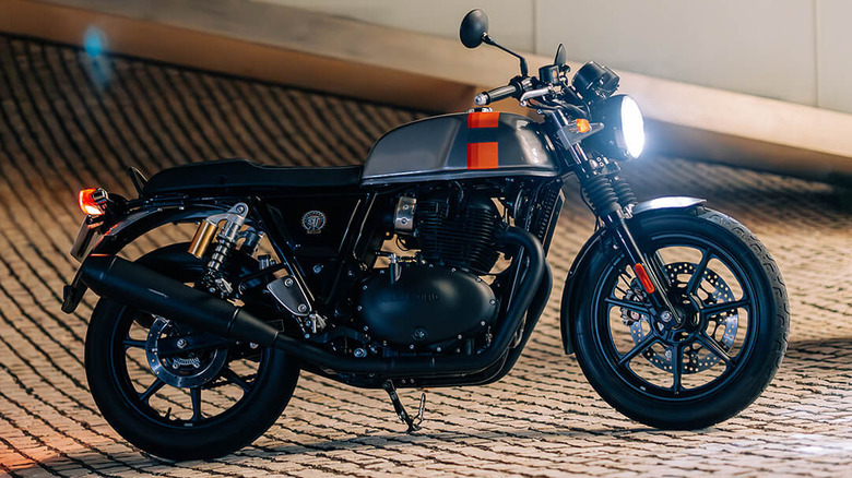 Royal Enfield parked on a brick street