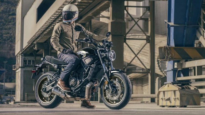 Yamaha XSR700 with a rider seated and parked