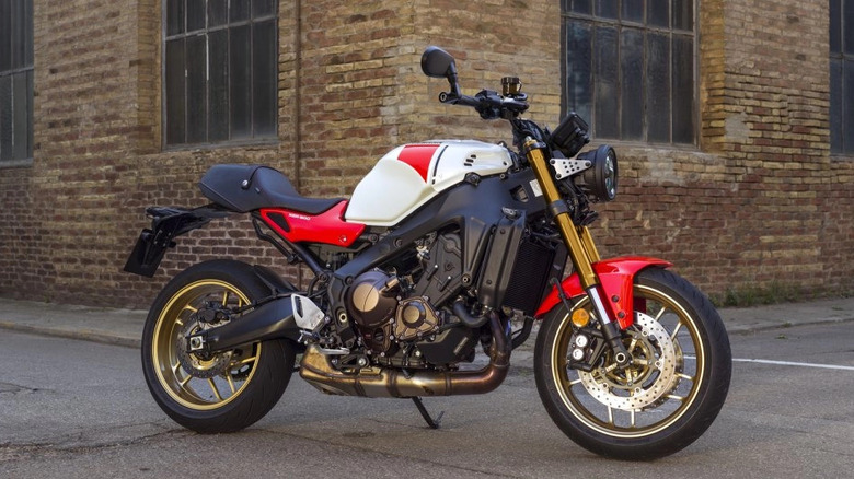 Yamaha XSR900 parked in front of a brick building