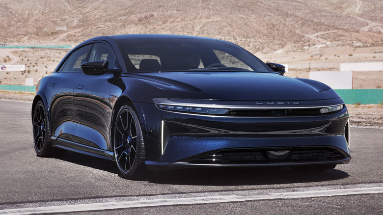 Dark blue Lucid Air Sapphire parked on a race track