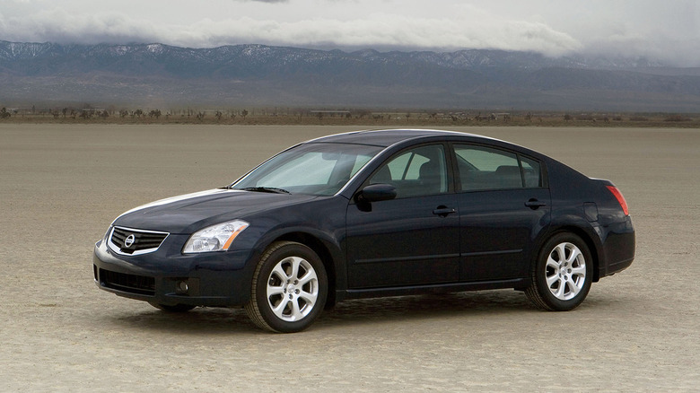 A black 2008 Nissan Maxima parked