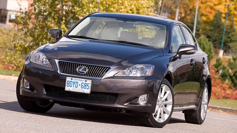 A dark brown 2009 Lexus IS parked