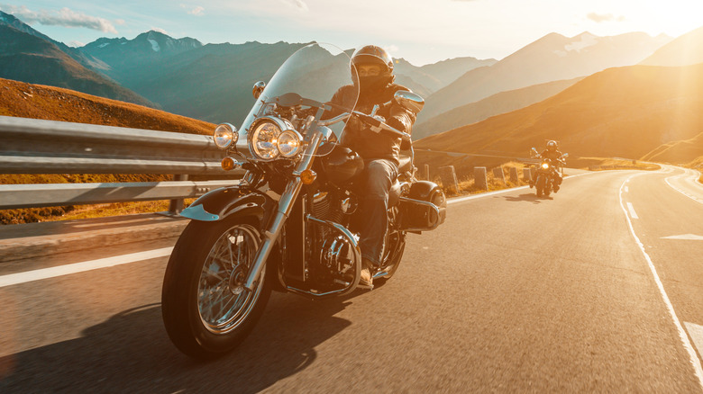 A rider cruising his cruiser bike on an American highway