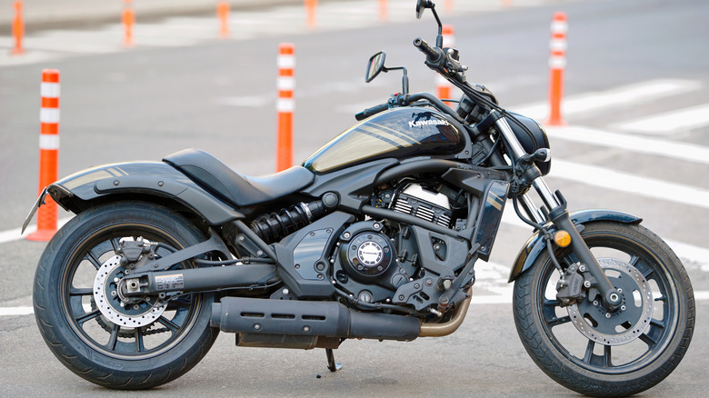 A black color Kawasaki Vulcan S parked by the street