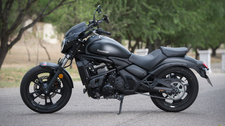 A black Kawasaki Vulcan S parked in a road in Madrid, Spain