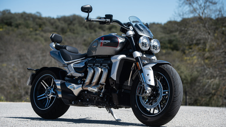 A Triumph Rocket 3 parked by the road