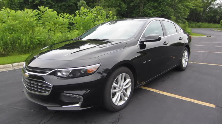 A black 2022 Chevrolet Malibu parked