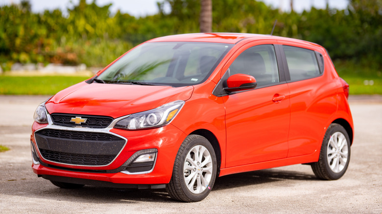 A red 2020 Chevrolet Spark parked