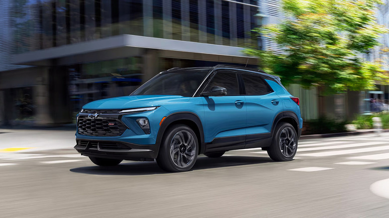 A blue 2025 Chevrolet Trailblazer driving