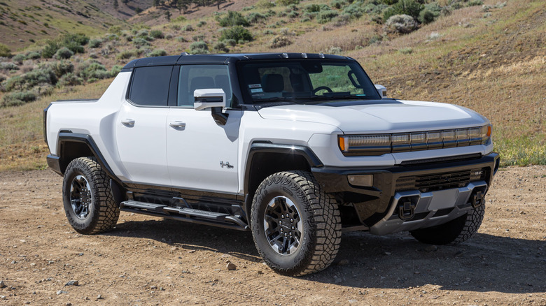 GMC Hummer EV parked on mountainside