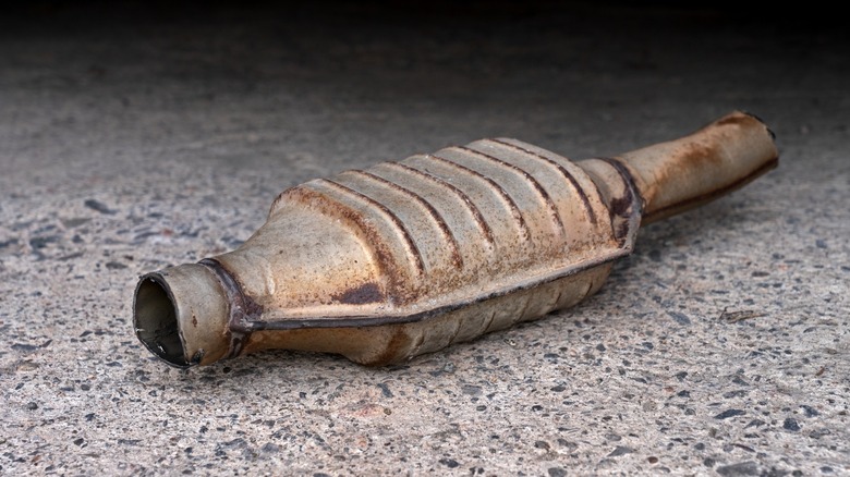 Catalytic converter resting on the ground