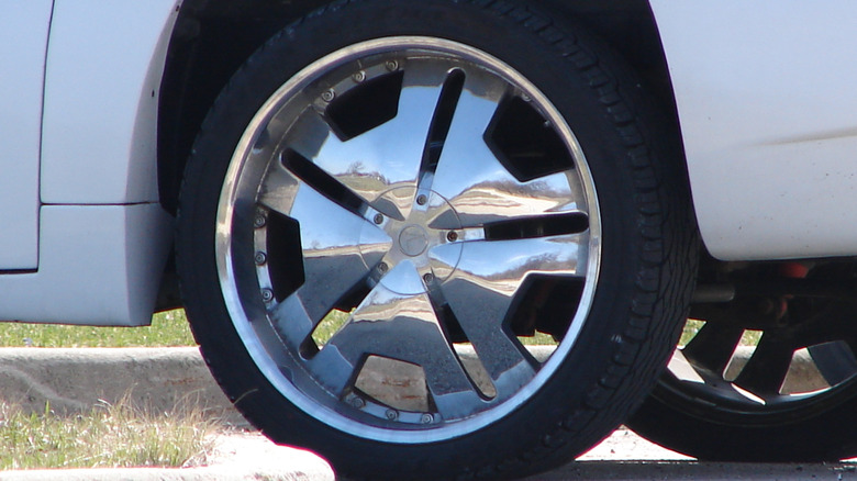 Shiny hubcap on a car tire