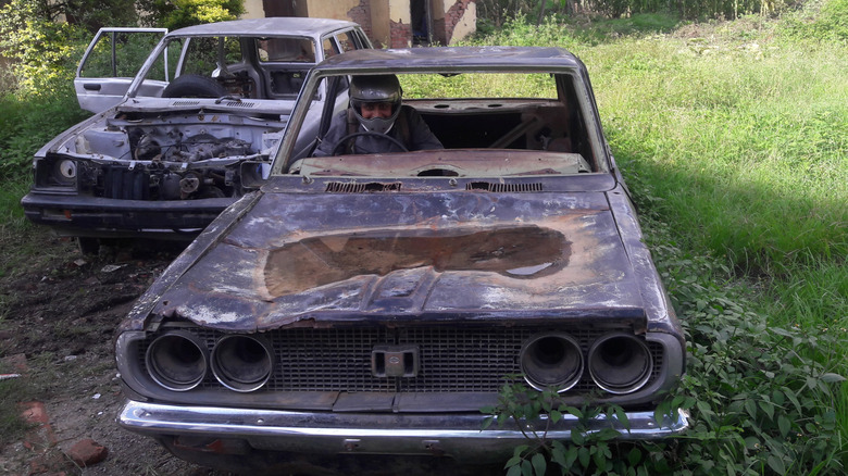 Busted up scrap car
