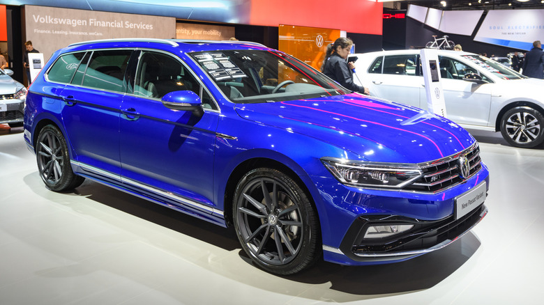 A Volkswagen Passat station wagon version on display at an an indoor auto show