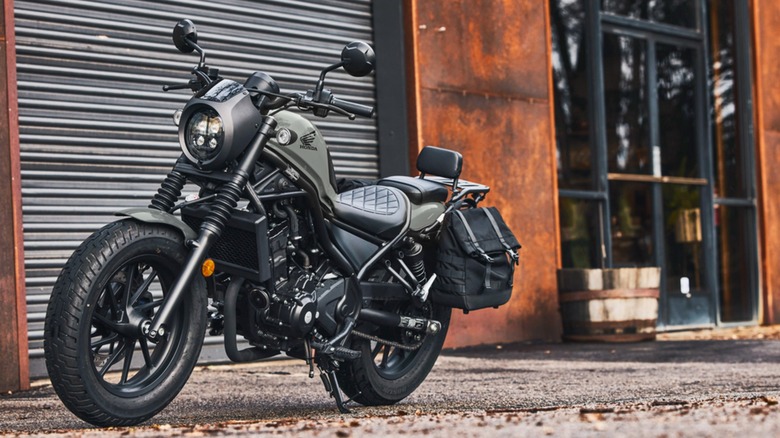 Honda Rebel 300 by a garage