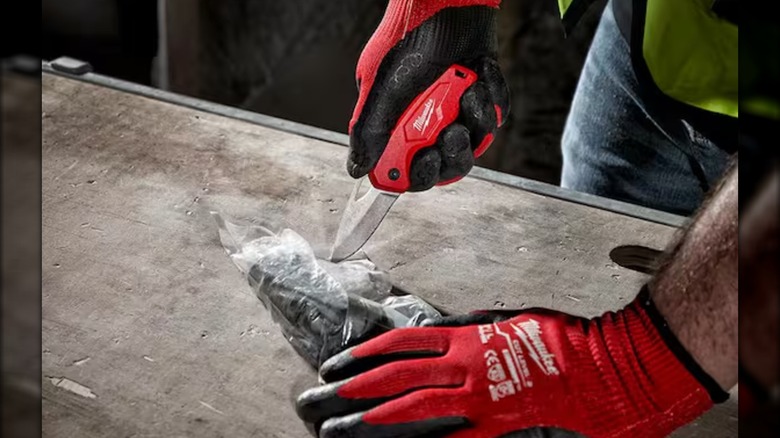 cutting open packaging with Milwaukee folding knife