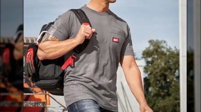 worker wearing Milwaukee cotton shirt on jobsite