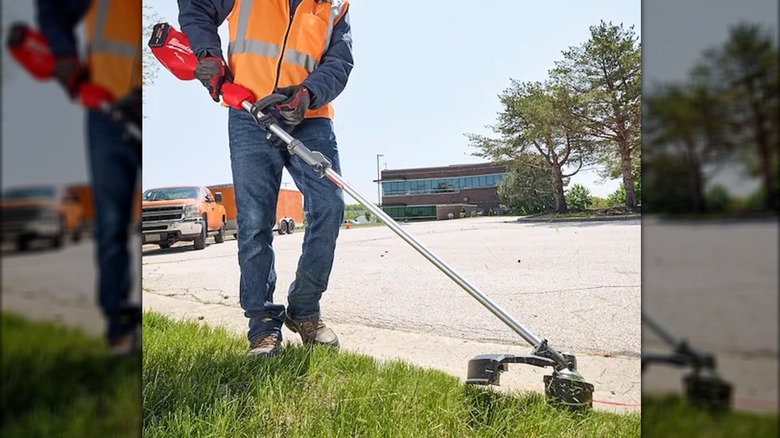 cutting grass edge with M18 Fuel string trimmer