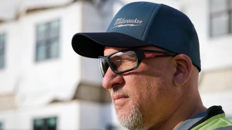 worker wearing Milwaukee hat
