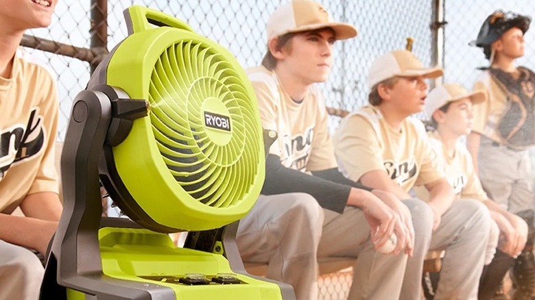 Misting fan cooling baseball team