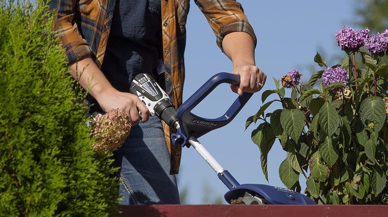 using drill cultivator attachment in garden