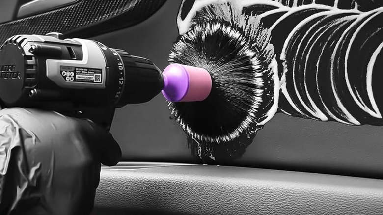 using drill brush attachment to clean car