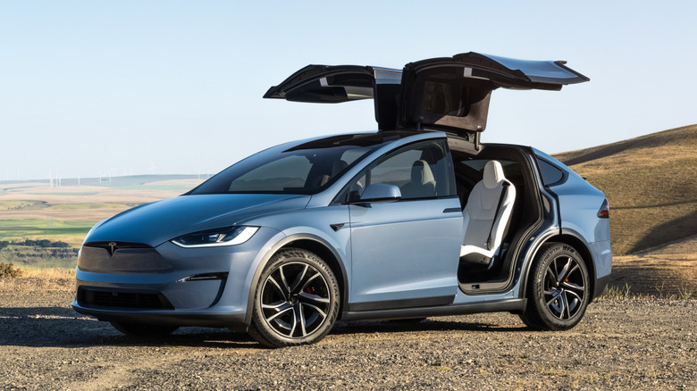 Tesla Model X with its doors raised
