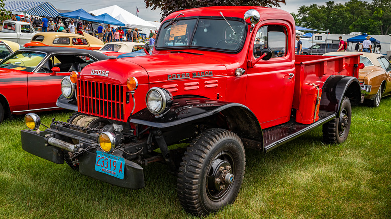 The front-left view of a 1949 first series Dodge power wagon at a motor show