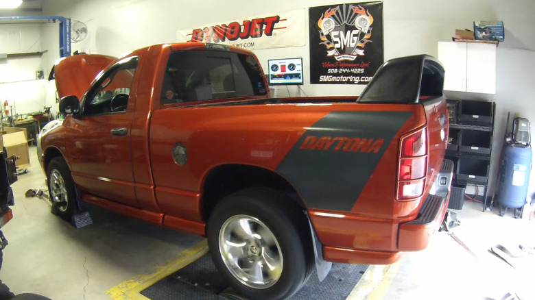 A red-orange RAM 1500 Daytona Shorty on a dyno undergoing a horsepower measurement