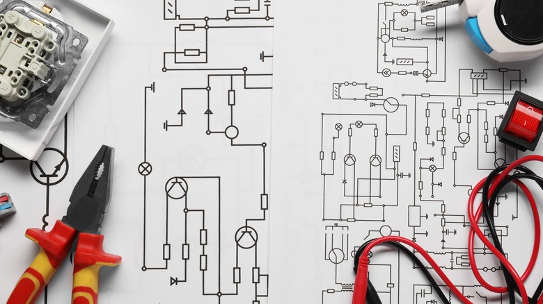 a complex wiring diagram and electrical tools