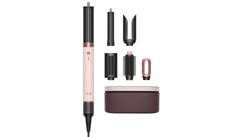 Collection of hair tools against a white background