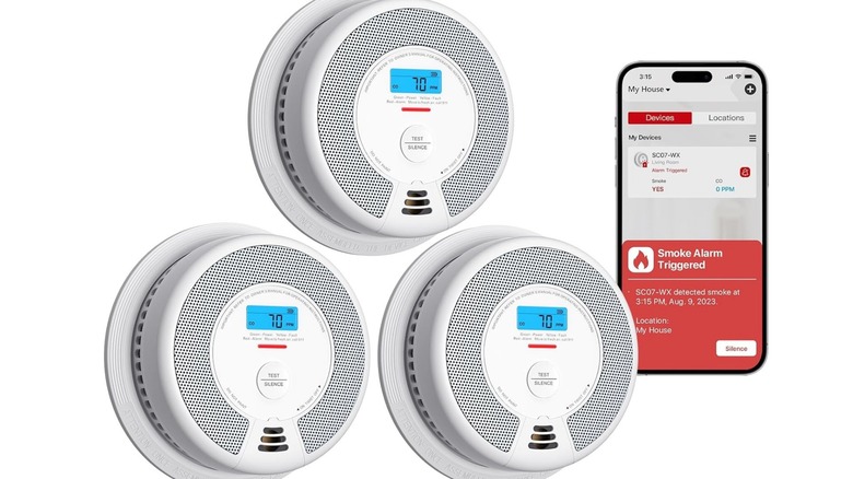 Three smoke detectors arranged in a triangle formation