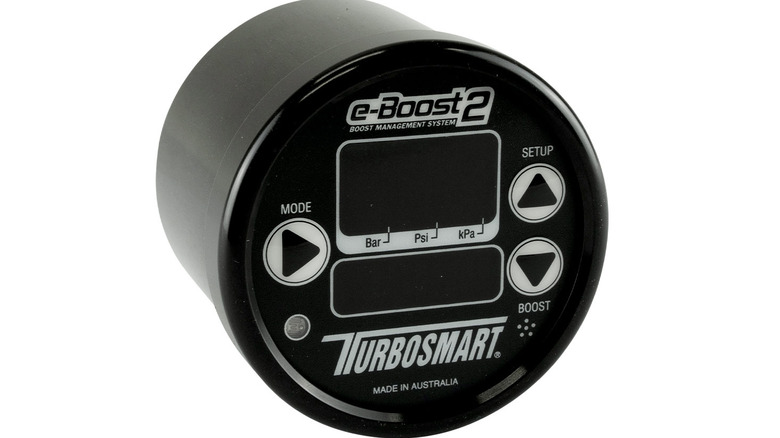 A black Turbosmart e-Boost2 electronic boost controller with digital display.