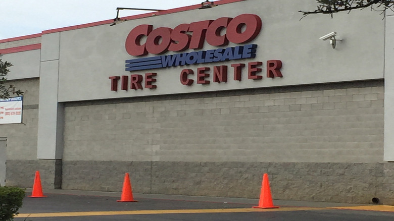 A Costco Wholesale Tire Center shop with the shutters down