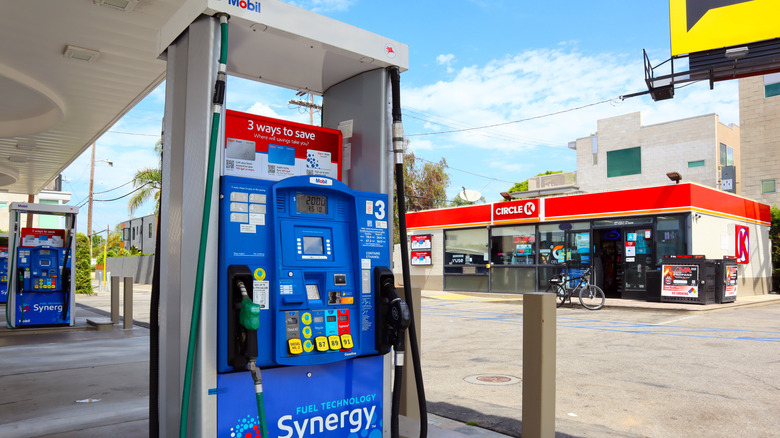 A MOBIL gas station in California with a store in the background/