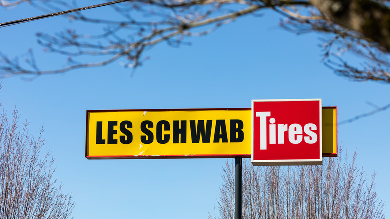 A sigh with the Les Schwab Tires logo in yellow and red