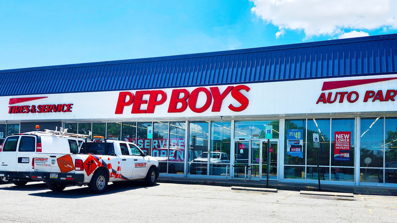 A Pep Boys auto and tire workshop in the signature color scheme of red, white and blue.