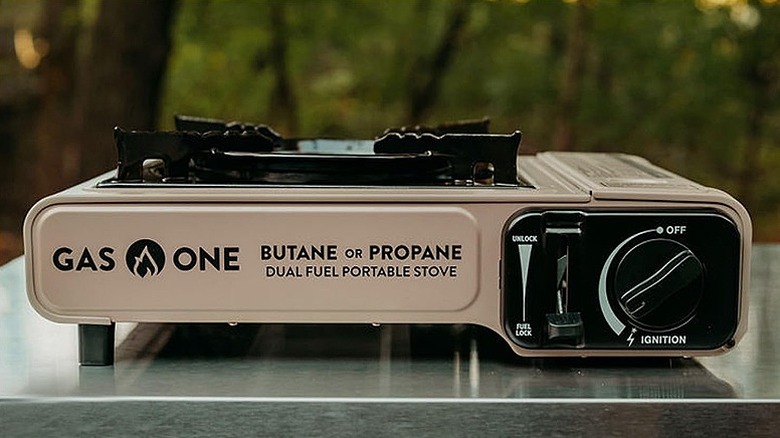 Gas One portable Stove placed on a metal surface.
