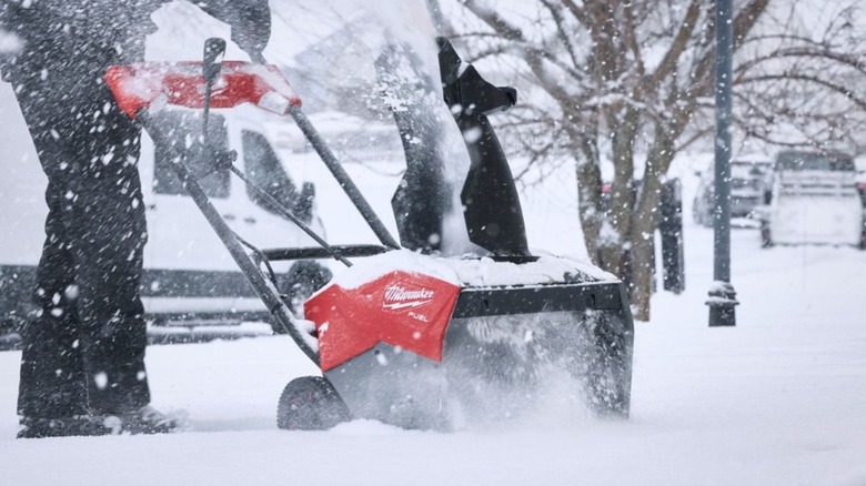 Milwaukee snow blower in action