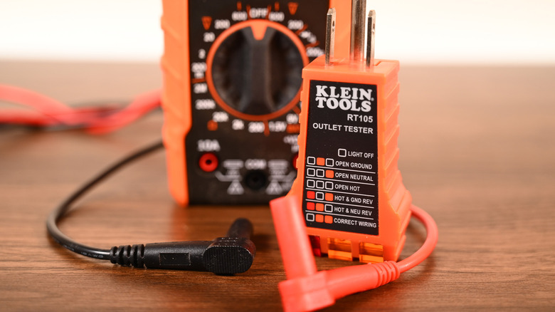 A Klein Tools outlet tester showing what the various lights mean.